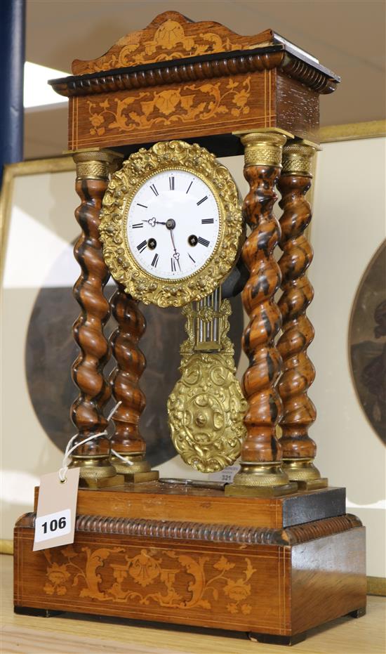 A 19th century French marquetry and rosewood portico clock 48cm.